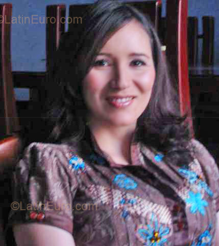 Date this happy Colombia girl Olga Lucia from Bogota CO5004